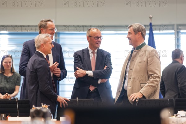 Karsten Wildberger (CDU, Federal Minister for Digitalisation and State Modernisation), Alexander Schweitzer (SPD, Minister President of Rhineland-Palatinate), Federal Chancellor Friedrich Merz (l, CDU) and Markus Söder (CSU Chairman and Minister President of Bavaria) in front of the meeting between Federal Chancellor Friedrich Merz and the heads of government of the federal states in the International Conference Hall of the Federal Chancellery, Berlin, 18.06.2025