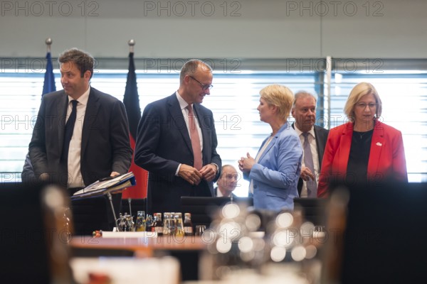 Lars Klingbeil (SPD, Vice-Chancellor and Federal Minister of Finance), Friedrich Merz (CDU, Federal Chancellor), Manuela Schwesig (SPD, Minister-President of Mecklenburg-Western Pomerania) and Anke Rehlinger (SPD, Minister-President of Saarland) in front of the meeting between Federal Chancellor Friedrich Merz and the heads of government of the federal states in the International Conference Hall of the Federal Chancellery, Berlin, 18 June 2025
