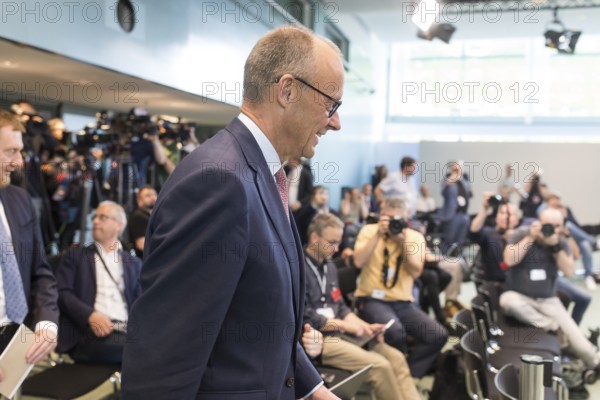 Friedrich Merz (CDU, Federal Chancellor) on his way to the press conference after the consultation between Federal Chancellor Friedrich Merz and the heads of government of the federal states in the Federal Chancellery, Berlin, 18 June 2025
