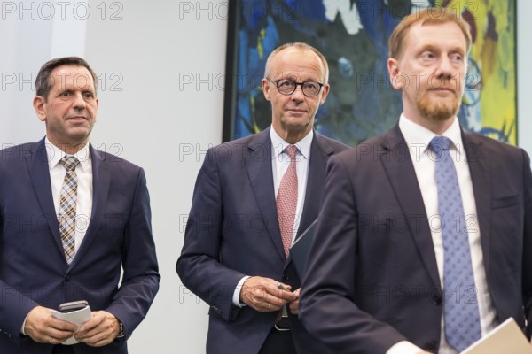 Olaf Lies (SPD, Minister President of Lower Saxony), Friedrich Merz (CDU, Federal Chancellor) and Michael Kretschmer (CDU, Minister President of the Free State of Saxony) after a press conference on the consultation between Federal Chancellor Friedrich Merz and the heads of government of the federal states at the Federal Chancellery, Berlin, 18 June 2025