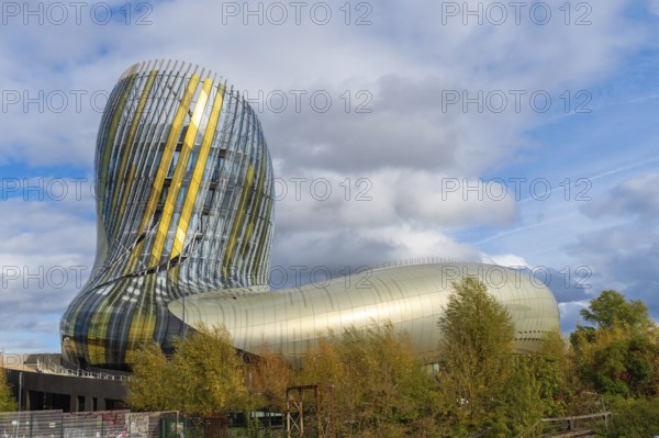 The cité du vin museum in bordeaux, france, showcases the city's rich wine heritage with its striking modern architecture