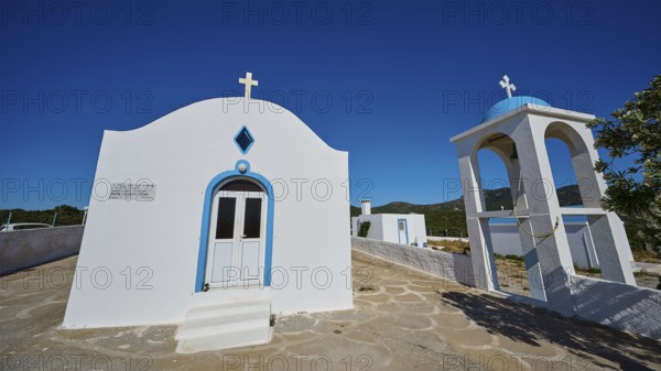 Chapel of Agios Charalambos, Traditional white chapel with bell tower and clear blue sky, Kefalos, Kos, Dodecanese, Greek Islands, Greece