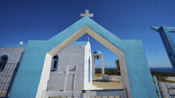 Chapel of Agios Charalambos, Blue and white Mediterranean church with clear sky and sea view, Kefalos, Kos, Dodecanese, Greek Islands, Greece