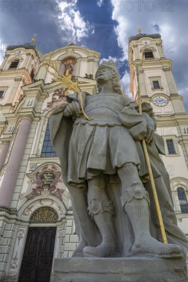 Sculpture of the church patron St Theodore in front of the east tower of the baroque Basilica of St Alexander and St Theodore, Ottobeuren Monastery, Ottobeuren, Unterallgäu, Bavaria, Germany