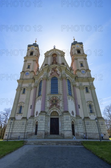 East tower of the baroque Basilica of St Alexander and Theodor, backlit, Ottobeuren Monastery, Ottobeuren, Unterallgäu, Bavaria, Germany