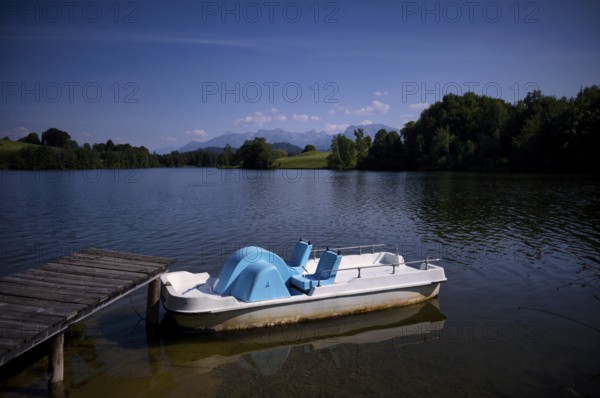 Pedal boat in a swimming lake, lake, swimming lake, Schwaltenweiher near Seeg, Ostallgäu, Allgäu, Swabia, Bavaria, Germany