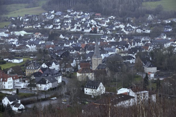 View over Balve in the Märkischer Kreis, a picturesque town in the Sauerland, view from the Pius Chapel to the town centre with the old Romanesque church of St. Blasius. Balve is known throughout the region for the largest cultural cave in Europe and the large equestrian tournaments that take place regularly, town in Sauerland, North Rhine-Westphalia, Germany, Western Europe