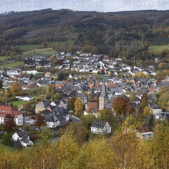View over Balve in the Märkischer Kreis, a picturesque town in the Sauerland, view from the Pius Chapel to the town centre in late autumn. Balve is known throughout the region for the largest cultural cave in Europe and the large equestrian tournaments that take place regularly, town in Sauerland, North Rhine-Westphalia, Germany, Western Europe