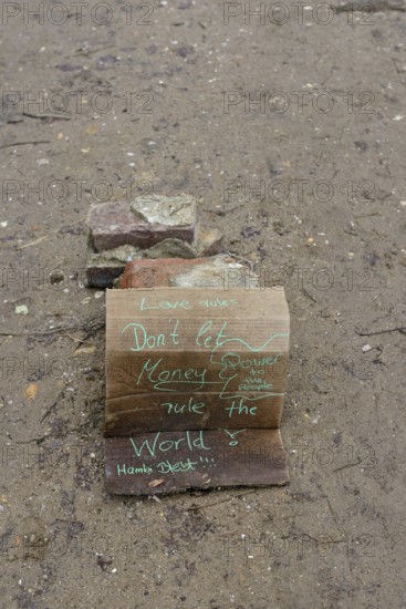 Protest sign in Hambach Forest, environmental activists protest against clearing for open-cast lignite mining. Hambach Forest became a nationally recognised symbol of resistance against the expansion of lignite mining and the fight against progressive climate change and global warming. Environmental activists and climate activists lived in tree houses for years to protest against deforestation. Hambach Forest, Düren district, North Rhine-Westphalia, Germany, Western Europe