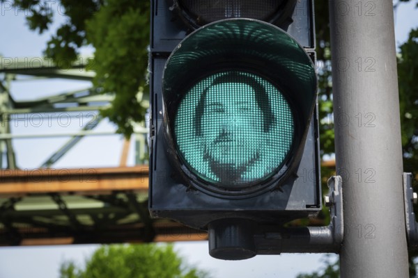 Portrait of Friedrich Engels on a pedestrian traffic light in Wuppertal, Germany