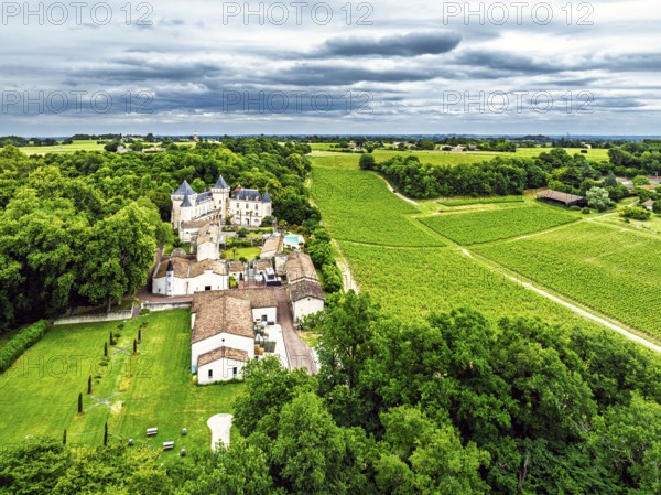 Castle of La Riviere, Vineyard Chateau de La Riviere from a drone, Bordeaux, France