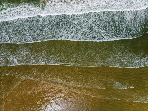 Top Down view over Waves and Contis beach from a drone, Saint Julien en Born, Saint-Julien-en-Born, Landes, France