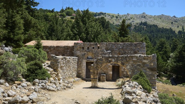 A small ancient ruin complex in a wooded area under a sunny sky, Abandoned Village, Lost Place, Pyli, Paleo Pyli, Byzantine Fortress, Kos, Dodecanese, Greek Islands, Greece