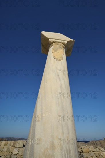 Close-up of an ancient column in front of a deep blue sky, Agios Stefanos Beach, Agios Stefanos Basilica, Chapel of Agios Nikolaos, Kastri Island, Kos, Dodecanese, Greek Islands, Greece