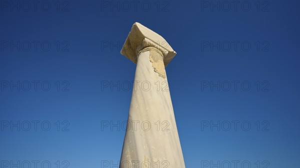 Ancient column imposing against deep blue sky, Agios Stefanos Beach, Agios Stefanos Basilica, Chapel Agios Nikolaos, Kastri Island, Kos, Dodecanese, Greek Islands, Greece