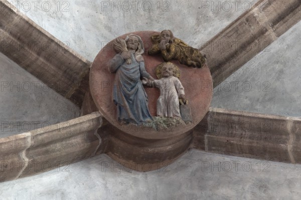 Mary dragging the infant Jesus into the school, keystone in the altar vault of the Church of Our Lady, Nuremberg, Middle Franconia, Bavaria, Germany