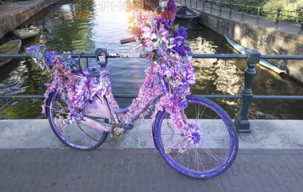 Holland, Amsterdam canals with scenic bridges and historic city center, UNESCO World Heritage site