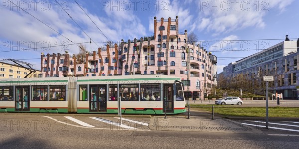 Green Citadel, architect Friedensreich Hundertwasser, modern architecture, tram, overhead lines, tram tracks, pedestrian crossing, general architecture, blue sky, cumulus clouds, Breiter Weg, Magdeburg, state capital, independent city, Saxony-Anhalt, Germany