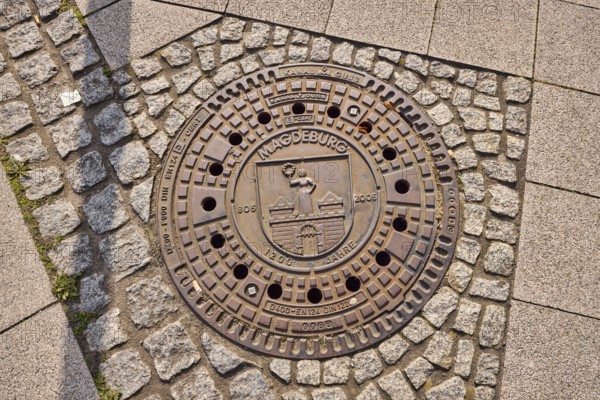 Sewer cover, 1200 years Magdeburg 805 to 2005, Magdeburg, state capital, independent city, Saxony-Anhalt, Germany