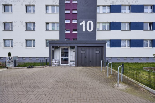 High-rise building, residential building, façade, entrance area, window, door, house number, diffuse light, Salvador-Allende-Straße, Magdeburg, state capital, independent city, Saxony-Anhalt, Germany