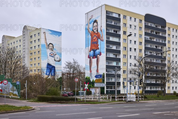 MWG-Wohnungsgenossenschaft eG Magdeburg, high-rise buildings, residential building, lantern, advertising painting, diffuse light, cloudy, intersection Ebendorfer Chaussee with access to Magdeburger Ring, Magdeburg, state capital, independent city, Saxony-Anhalt, Germany