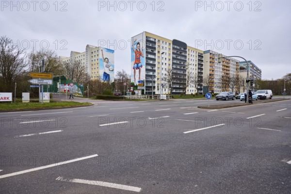 MWG-Wohnungsgenossenschaft eG Magdeburg, high-rise buildings, residential buildings, residential silos, road, asphalt, road markings lanes, diffuse light, cloudy, intersection Ebendorfer Chaussee with access to Magdeburger Ring, Magdeburg, state capital, independent city, Saxony-Anhalt, Germany