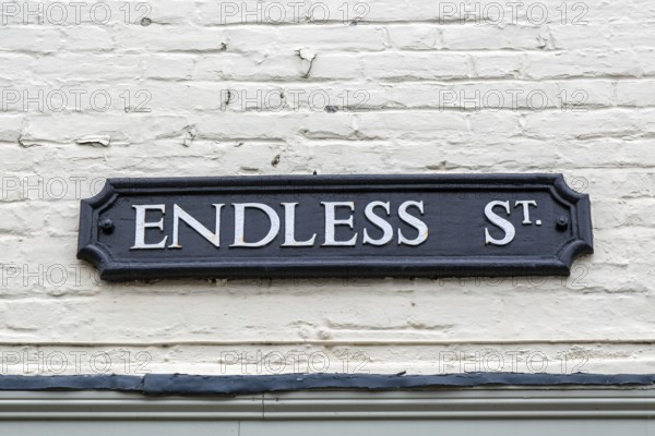 Sign on wall for Endless Street, Salisbury, Wiltshire, England, UK