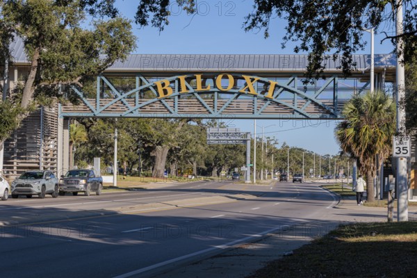 Sign on pedestrian bridge over US Highway 90 in Biloxi, Mississippi