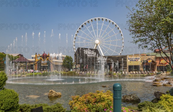 The Wheel ferris wheel behind the Ole Smoky Moonshine store at The Island recreation center in Pigeon Forge, Tennessee