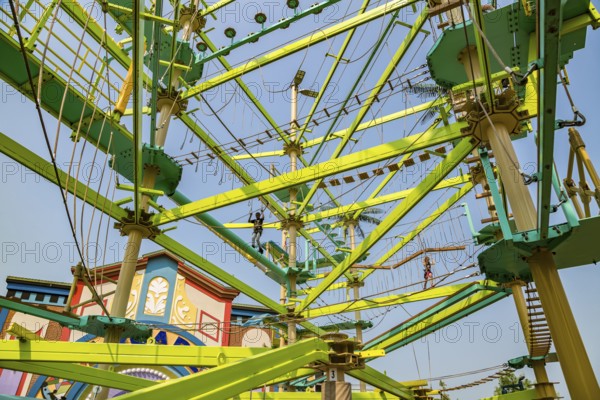 Children climbing through The Island Ropes Course at The Island recreation center in Pigeon Forge, Tennessee