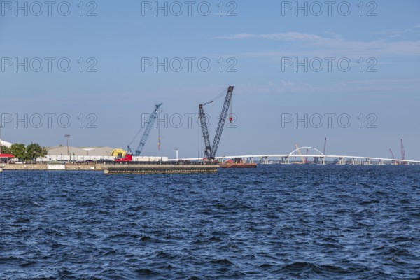 Construction of the Pensacola Bay Bridge reopening in May 2021 after being struck by a barge and a fallen crane during Hurricane Sally in 2020