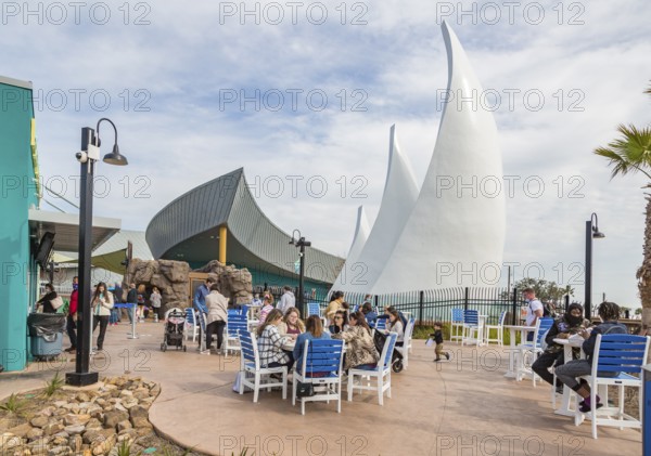 Visitors eating at the Pelican Pointe Cafe in the Mississippi Aquarium on the gulf coast at Biloxi, Mississippi