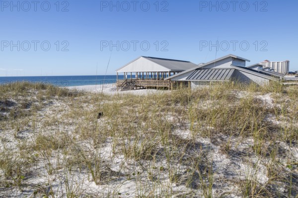 National Park Service sign welcomes visitors to the Rosamond Johnson Jr. Beach in the Perdido Key area of the Gulf Islands National Seashore in Perdido Key, Florida