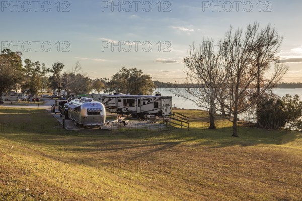 Recreational vehicles parked on the bank of Lake Seminole in the Corps of Engineers Eastbank Campground in Bainbridge, Georgia