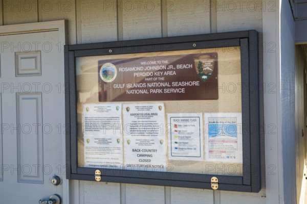 National Park Service sign welcomes visitors to the Rosamond Johnson Jr. Beach in the Perdido Key area of the Gulf Islands National Seashore in Perdido Key, Florida