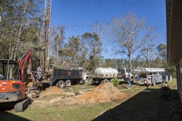 Residential water well drilling operation in rural area of Gulfport, Mississippi, USA