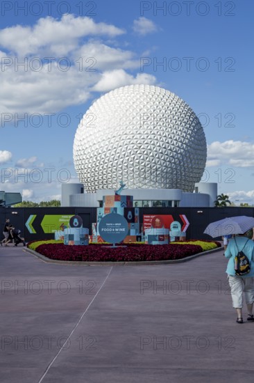 Sign in front of the Spaceship Earth geodesic sphere near entrance to the Food and Wine Festival in Epcot at Walt Disney World in Orlando, Florida