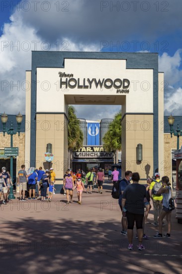 Entrance to Disney's Hollywood Studios theme park with sign mandating masks to contain the spread of Covid 19 virus pandemic