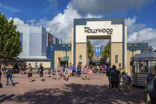 Entrance to Disney's Hollywood Studios theme park with sign mandating masks to contain the spread of Covid 19 virus pandemic
