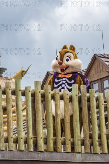 Chipmunk Dale in a Halloween costume welcomes guests in the Frontierland area of Magic Kingdom at Walt Disney World, Orlando, Florida