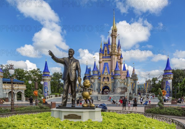 Partners statue in front of Cinderella's Castle at the end of Main Street in the Magic Kingdom at Walt Disney World, Orlando, Florida