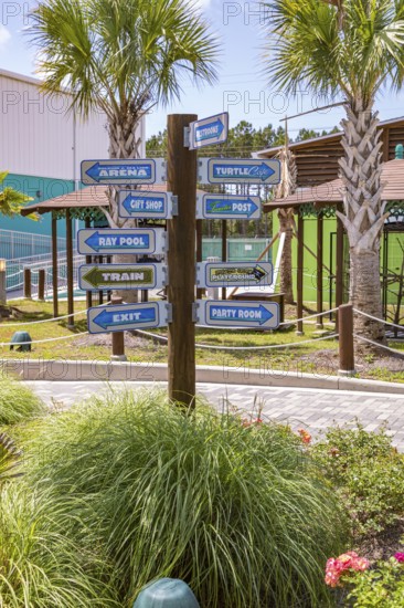 Sign directs guests to different attractions at Ocean Adventures Marine Park in Gulfport, Mississippi