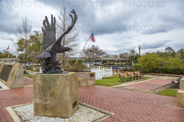 Freedom statue eagle centered in the Santa Rosa County Veterans Memorial Plaza in downtown Milton, Florida