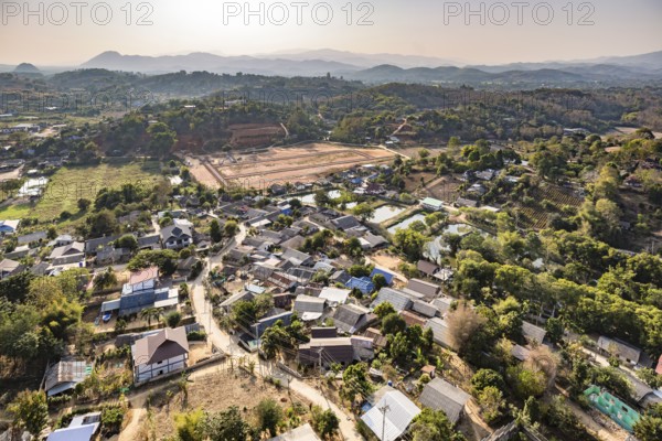 View from the top of the Guan Yin (Goddess of Mercy) statue at Wat Huay Pla Kang Temple in Chiang Rai province of Northern Thailand shows the surrounding rural countryside