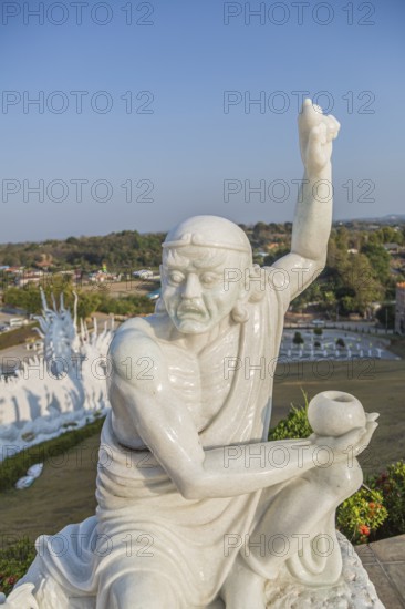 Statues around the perimeter of the Guan Yin (Goddess of Mercy) statue at Wat Huay Pla Kang Temple in Chiang Rai province of Northern Thailand