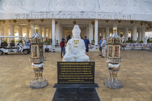 Buddhist shrine at the base of the Guan Yin (Goddess of Mercy) statue at Wat Huay Pla Kang Temple in Chiang Rai province of Northern Thailand