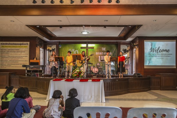 Praise team performing at the Baan Athitaan Church and Grace Language School in Chiang Rai, Thailand