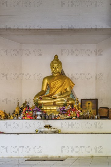 Buddah shrine at the Hall of Buddah Image on the campus of CRRU Shiangrai Rajabhat University in Chiang Rai, Thailand
