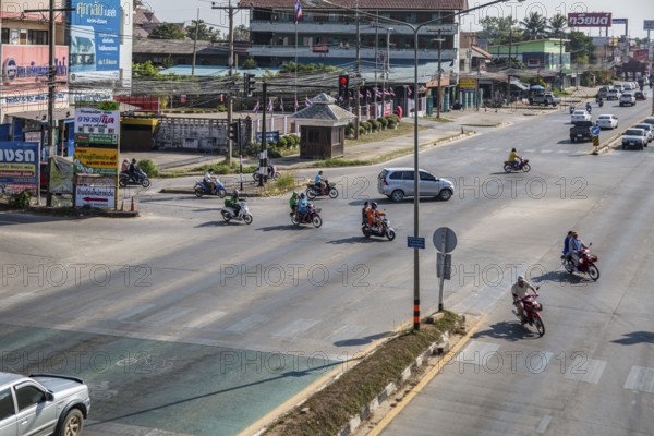 Motor scooter traffic in Chiang Rai, Thailand