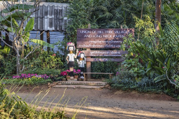 Sign near entrance of the Union of Hill Tribe Villages representing the Akha, Yao, Lahu, Kayaw, and Long neck Karen or Kayan people groups outside of Chiang Rai in the Nanglae District of Thailand
